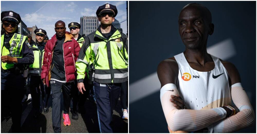 Eliud Kipchoge Photo of Marathon King Being Escorted by White