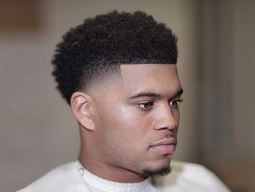 Blowout fade long face shape hairstyle