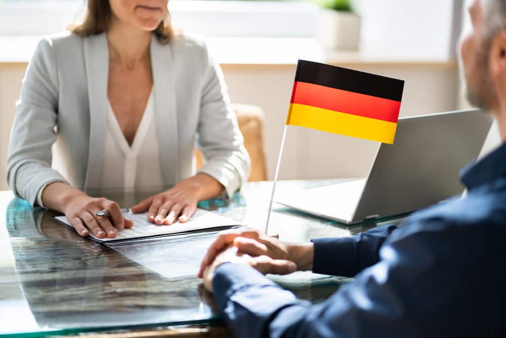 A German immigration applicant is at a Visa interview