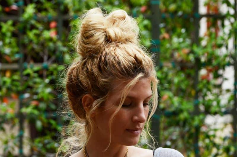 Woman with bow bun hairstyle