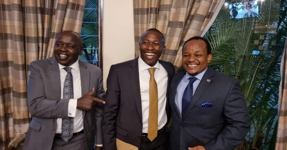 Ngunjiri Wambugu (right) shares a light moment with Senator Cherargei (left)and Kiambaa MP John Wanjiku.