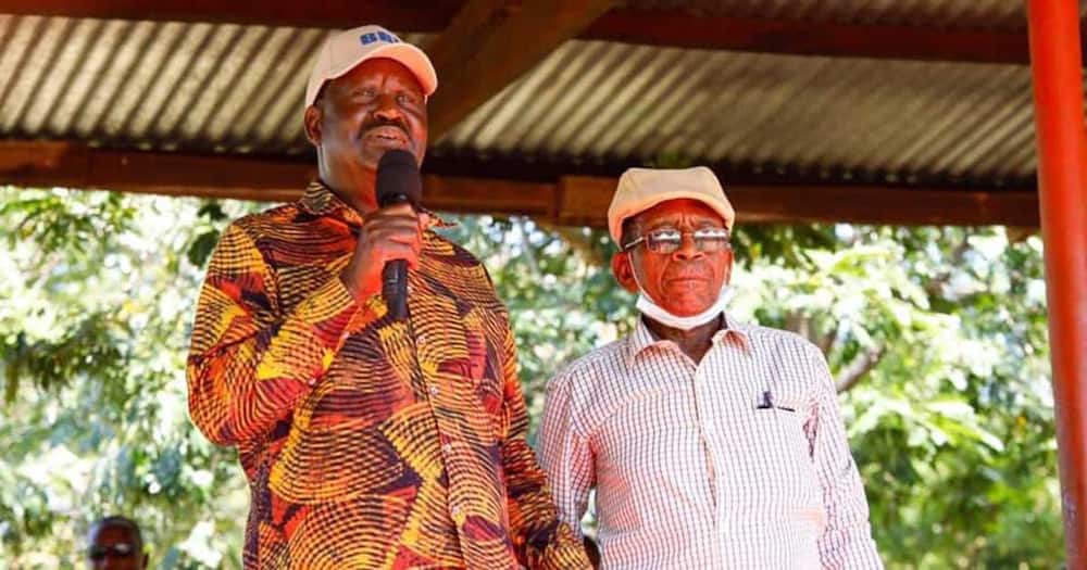 Raila Odinga and John Mwavuda.