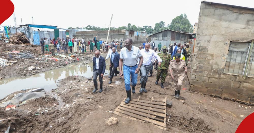 President William Ruto and CS Kithure Kindiki in Mathare to access the impacts of floods.