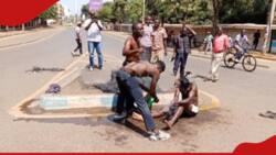 Maandamano: Men Take Bath on Kisumu Highway in Brought Daylight