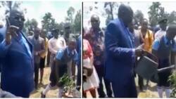 Magoha on the Spot Again for Belittling Man Helping Him Plant Trees in School: "Unanuka Chang'aa"