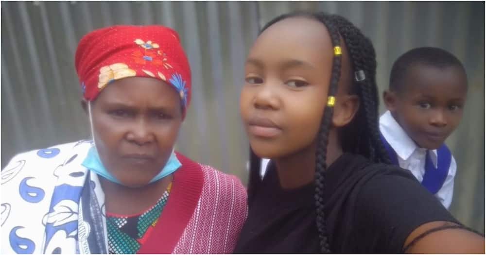 Mary Wangui Njoroge (l) and two of her grandchildren. Photo: Nation.