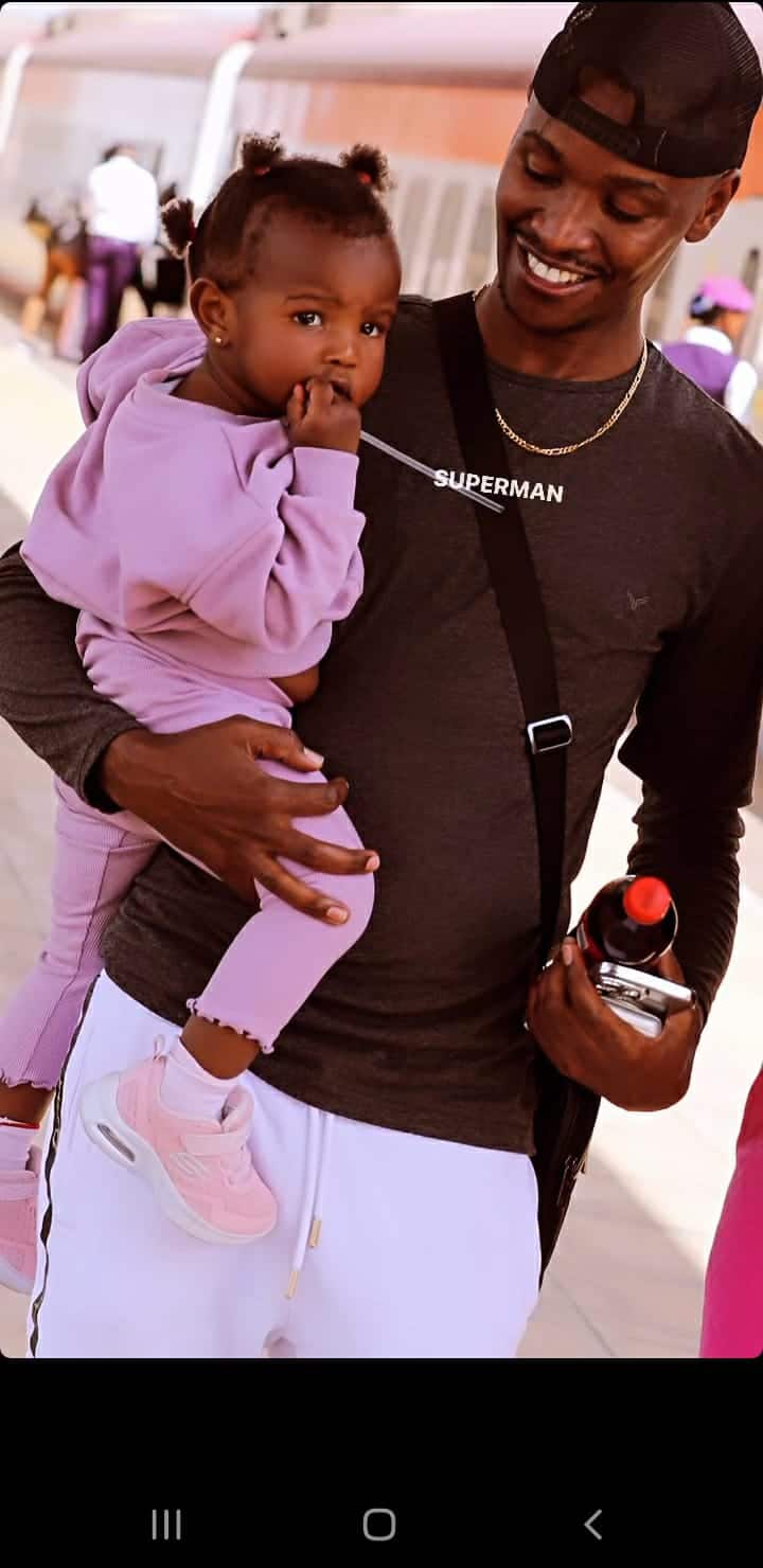 Samidoh Muchoki pose for a photo with daughter he sired with Karen Nyamu.
