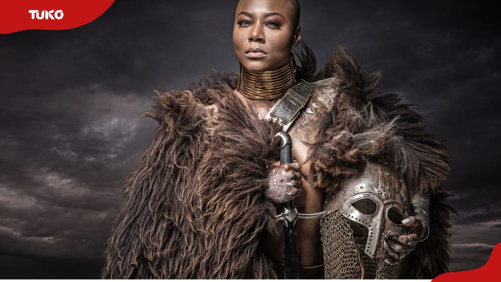 A photographic depiction of a black female Viking warrior