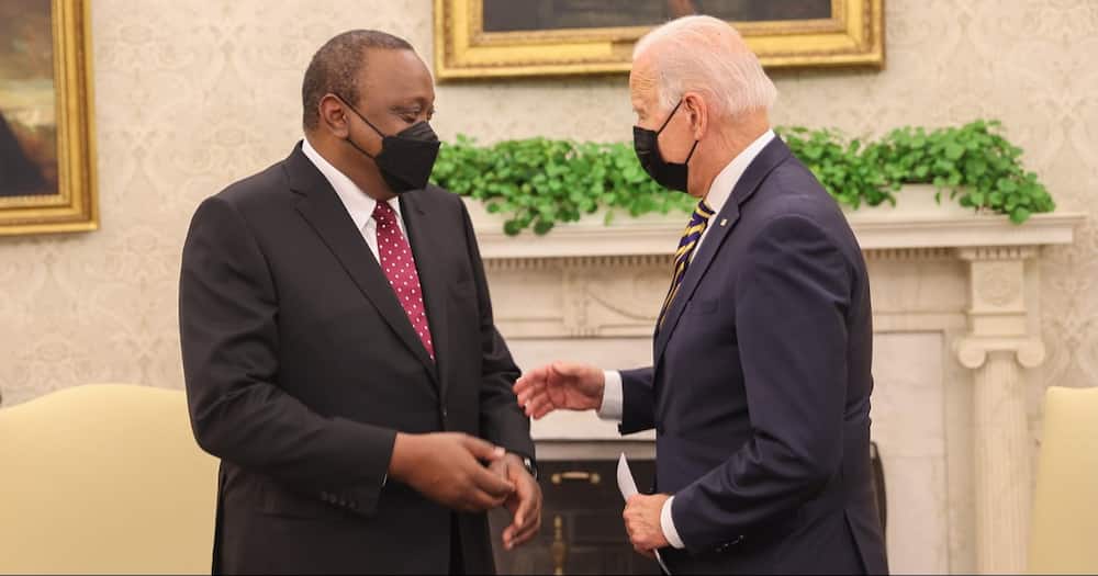Kenya's president Uhuru Kenyatta having a moment with his US counterpart Joe Biden.