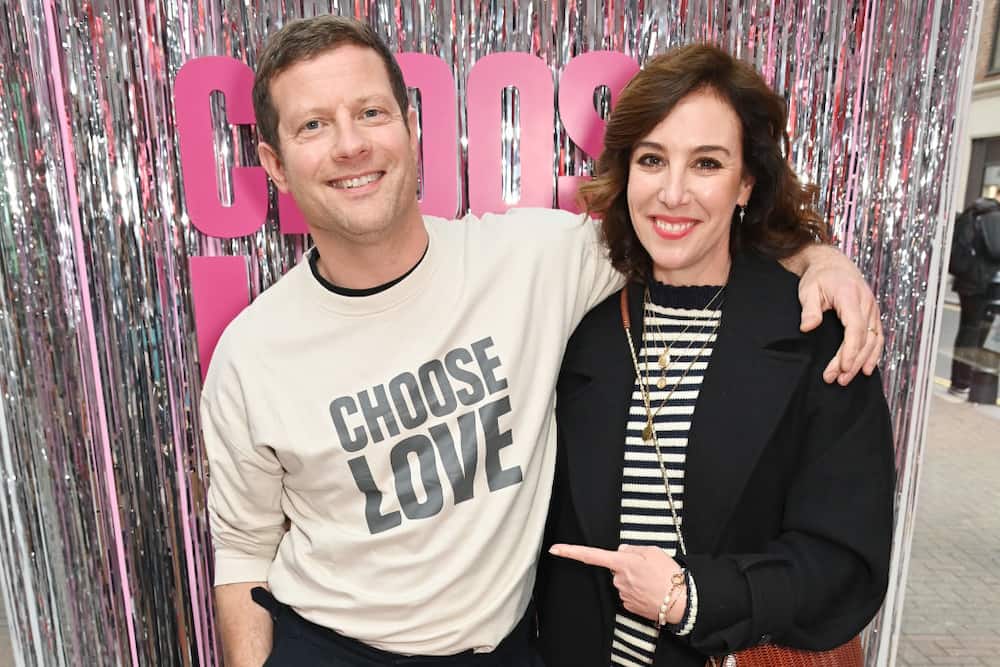 Dermot O'Leary and Dee Koppang O'Leary attend the launch of the 2023 Choose Love pop-up shop for Help Refugees on Carnaby Street in London, England.