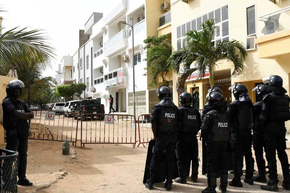 Police closed off the street leading to Senegal opposition leader Ousmane Sonko's home in Dakar on June 17, 2022
