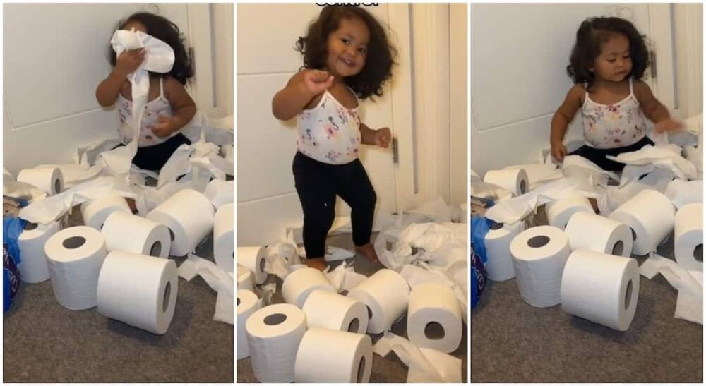 Photos of a baby girl who tore mum's tissue paper.