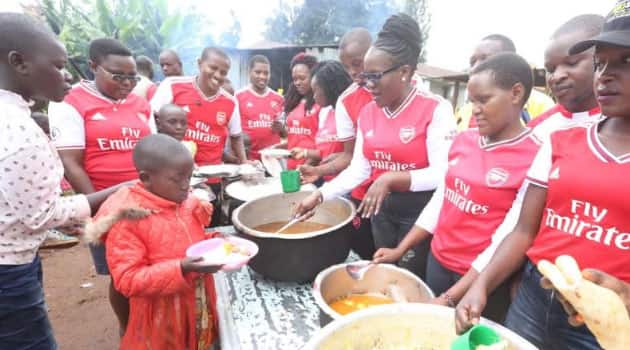 Kind Arsenal fans donate foodstuffs to children's home for Christmas