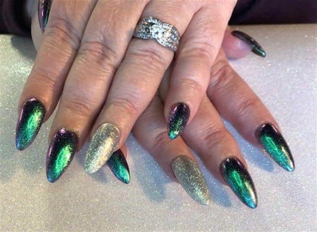 Green chrome and gold St. Patrick's Day nail design