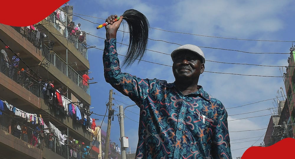 Raila Odinga waves at his supporters