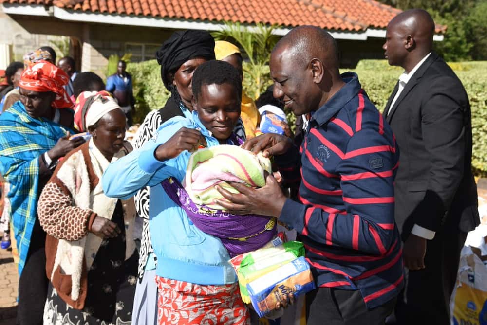 William Ruto gifts villagers with goats, wheat flour for Christmas celebrations
