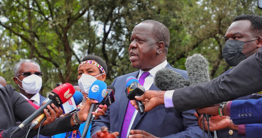 Interior CS Fred Matiang'i (c) has said the government would not shut down the internet during the 2022 General Election. Photo: Ministry of Interior.