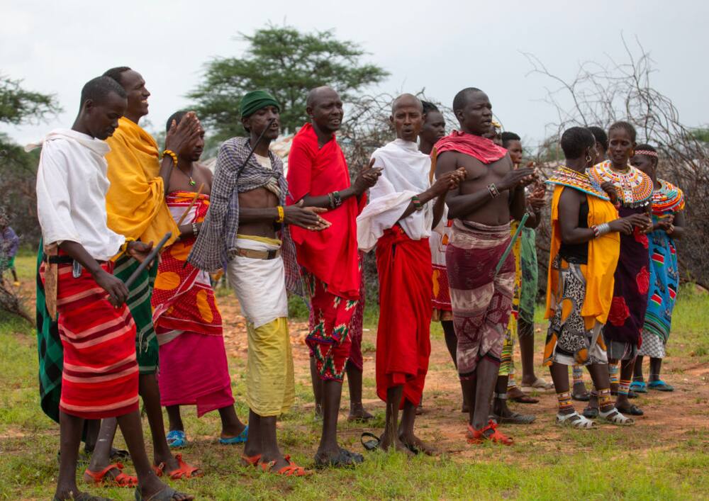 Samburu tribe men and women outside the Samburu National Reserve, Kenya.