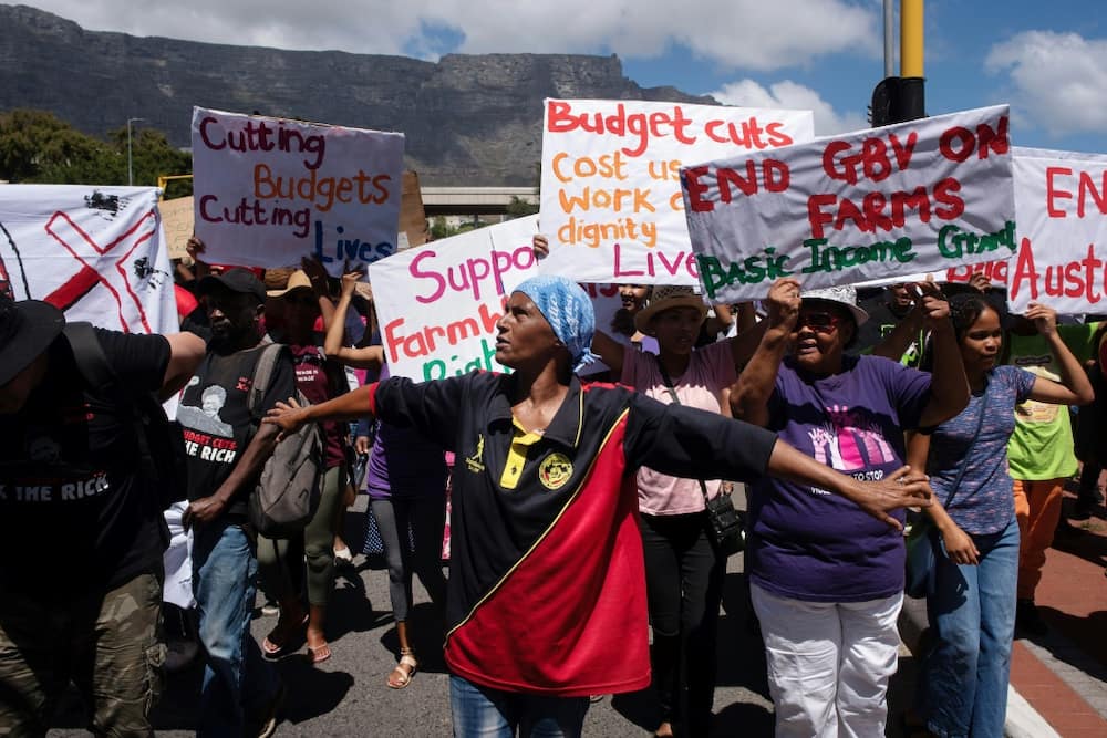 Hundreds of people protested outside the South African parliament as the ANC government unveiled its budget plans