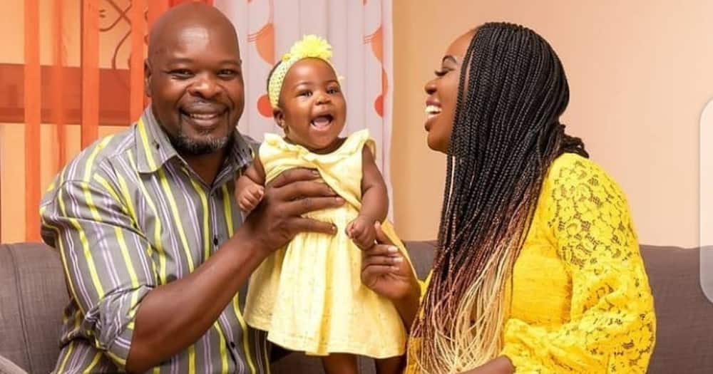 Abel Amunga spending time with his daughter and granddaughter. Photo: Ruth Matete.