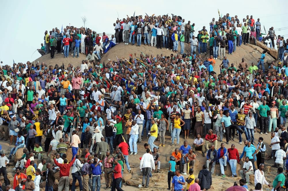 Mourners gather in Marikana on August 23, 2012, to remember those killed during the strike