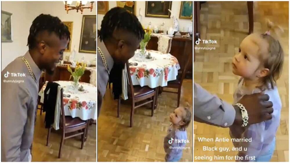 Interracial relationship/kid surprised to see black man.