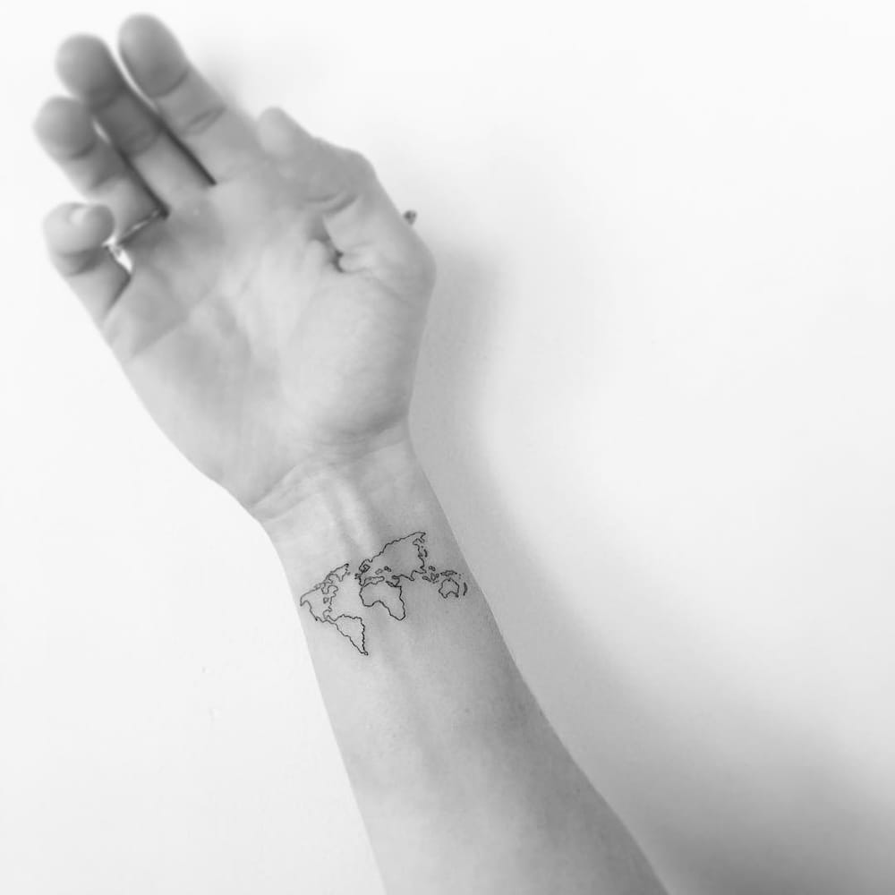 world wrist tattoo