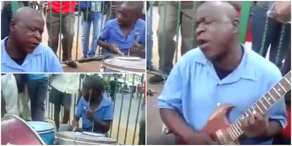 Visually impaired guitarist man and drummer son perform on street, wow people with their talents.