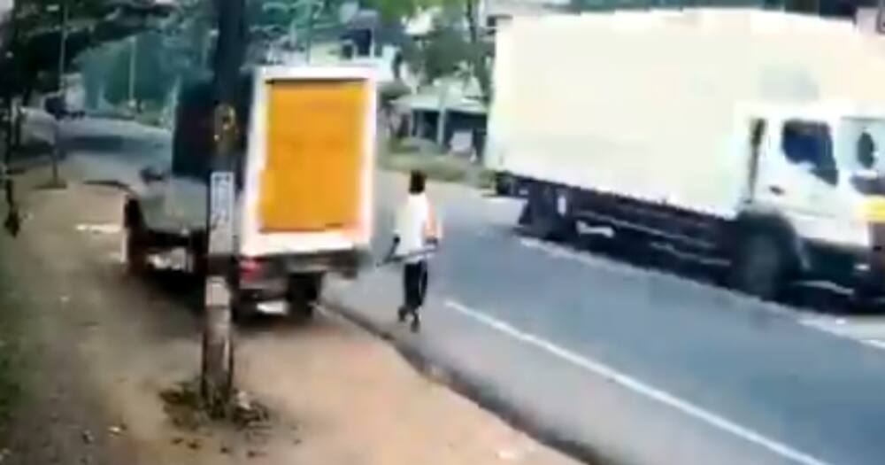 Video of man escaping death after speeding vehicle misses him by a whisker goes viral