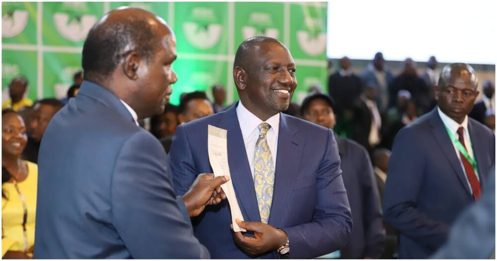 President-elect William Ruto receiving a certificate from IEBC chair Wafula Chebukati. Photo: William Ruto.