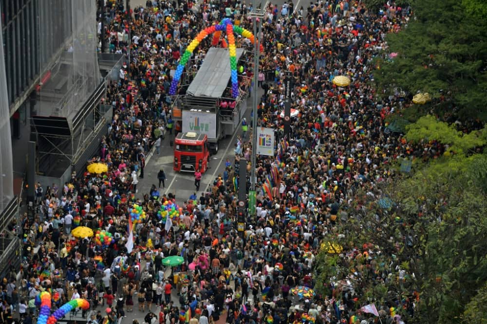 Hundreds of thousands of Brazilians take part in the Sao Paulo Pride Parade whose theme this year is "Vote with Pride – for policies that represent us"