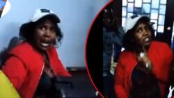 Video: Female Judiciary Officer Speaks In Tongues During Heated Scramble for Law Firm Property