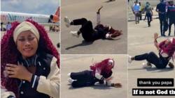 Drama as Lady Rolls on Floor, Creates Scene at Airport after Entering Plane for the First Time