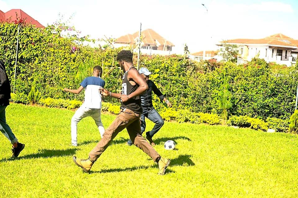 Ababu Namwamba playing football.