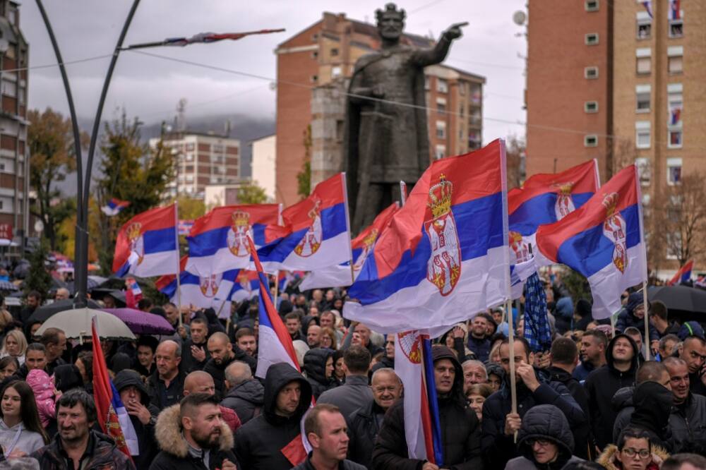 Kosovo Serbs wave Serbian flags during a protest in Mitrovica this month