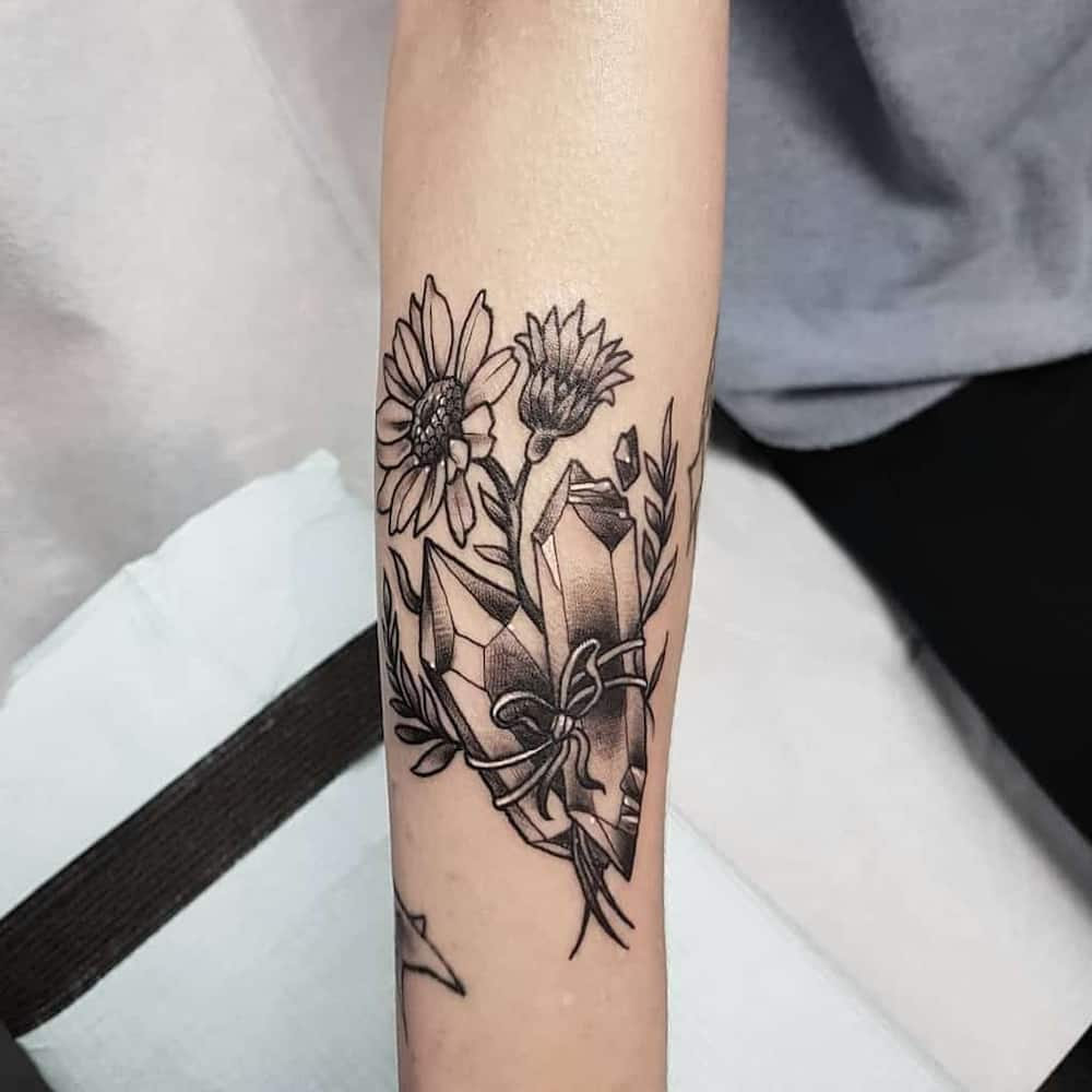 daisy wrist tattoo