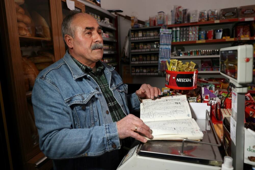 Grocers are using ledgers to write down debts owed by locals during Turkey's economic crisis