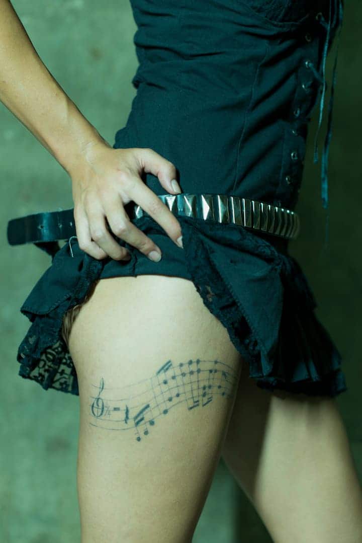 feminine classy thigh tattoos