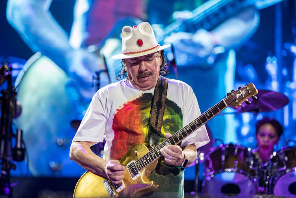 Guitarist Carlos Santana of Santana performs on stage