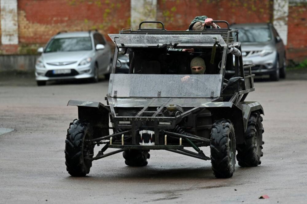Buggies built to order are used by Ukrainian forces to carry weapons and the wounded
