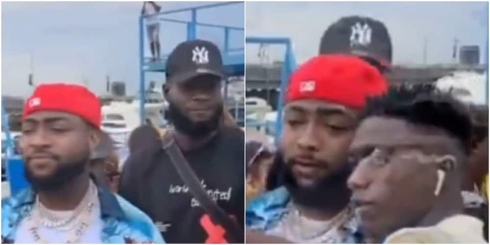 Massive reactions as singer Davido's bodyguard pushes fan away as he tries taking selfie with star