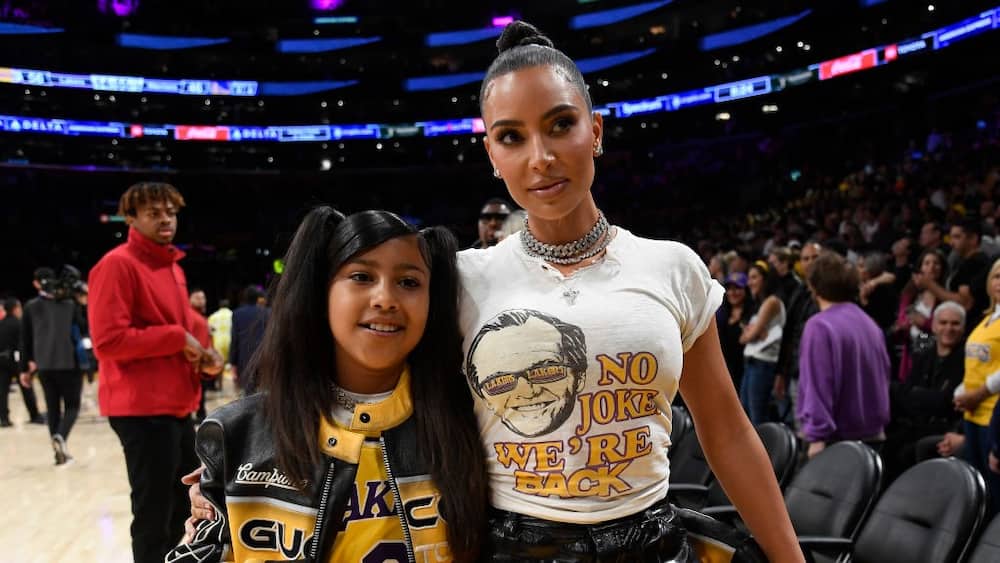 Kim Kardashian and daughter her North West, at the Western Conference Semifinal Playoff game