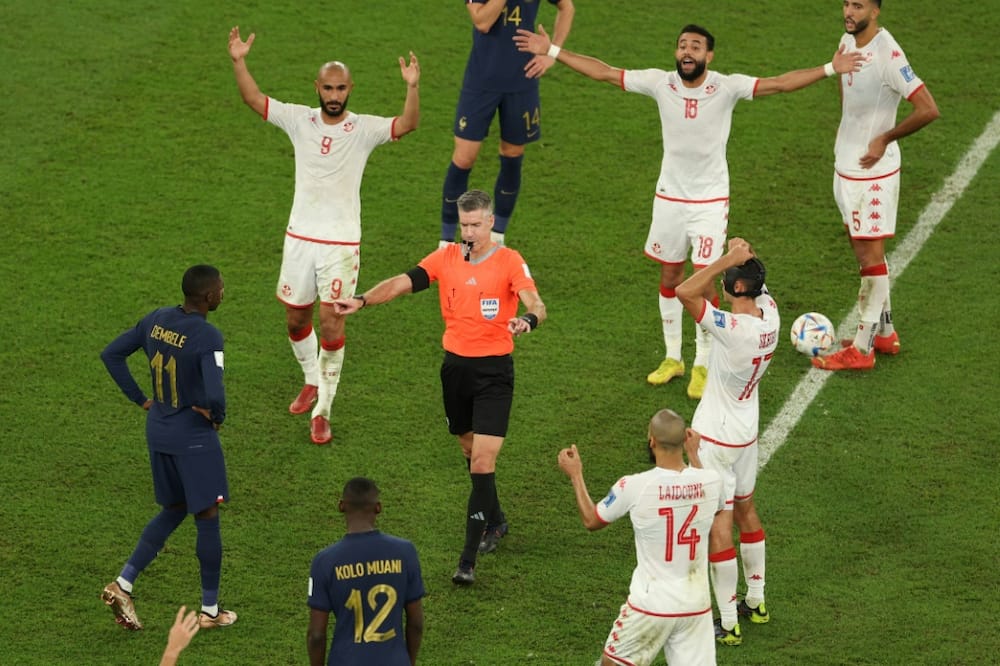 Referee Matthew Conger from New Zealand disallows Antoine Griezmann's late equaliser after a VAR check