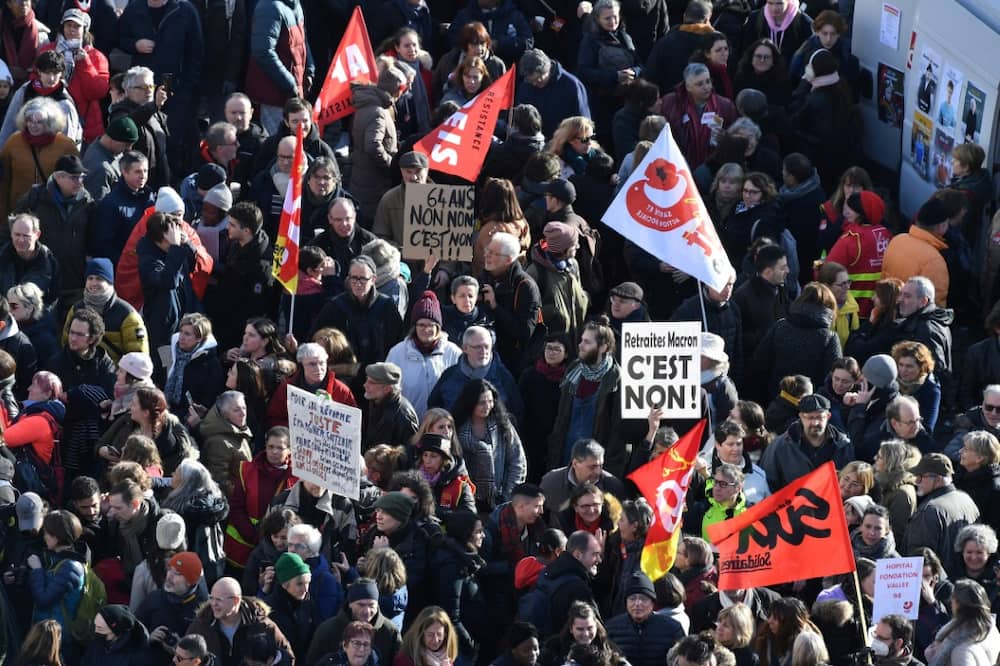 Protesters marched throughout France on Tuesday against President Emmanuel Macron's proposed pension reform