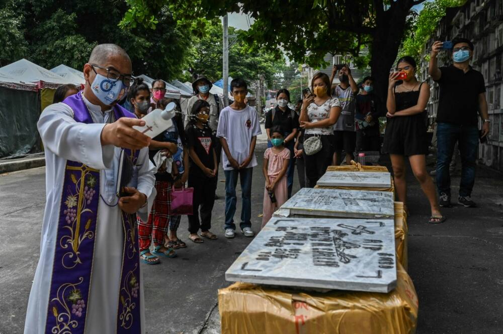 Father Flavie Villanueva (left) has received death threats and been charged with sedition for his criticism of Duterte's drug war