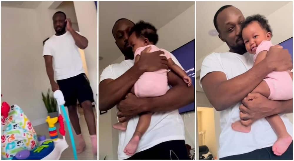 Photos of a man cuddling his baby girl who won't let go of him.
