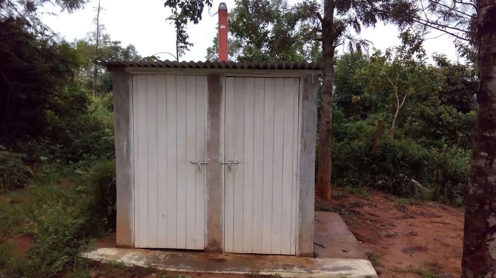 Ugandan woman delivers baby inside latrine