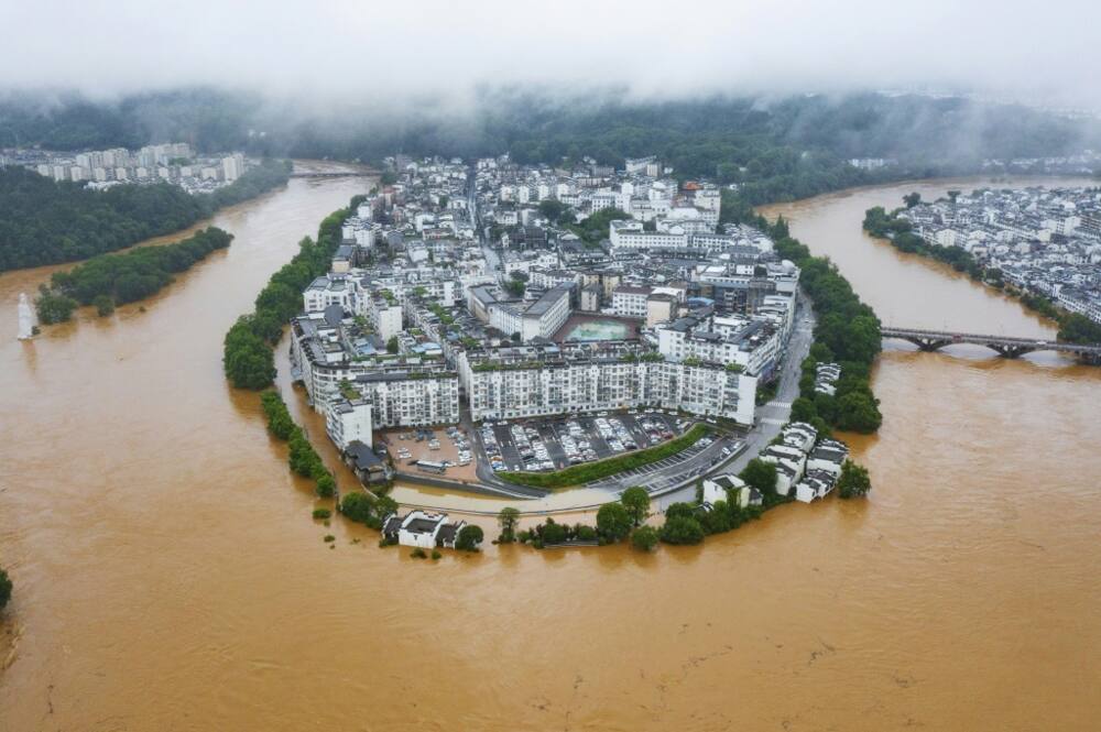 Parts of southern China have been hit by the heaviest rain in decades