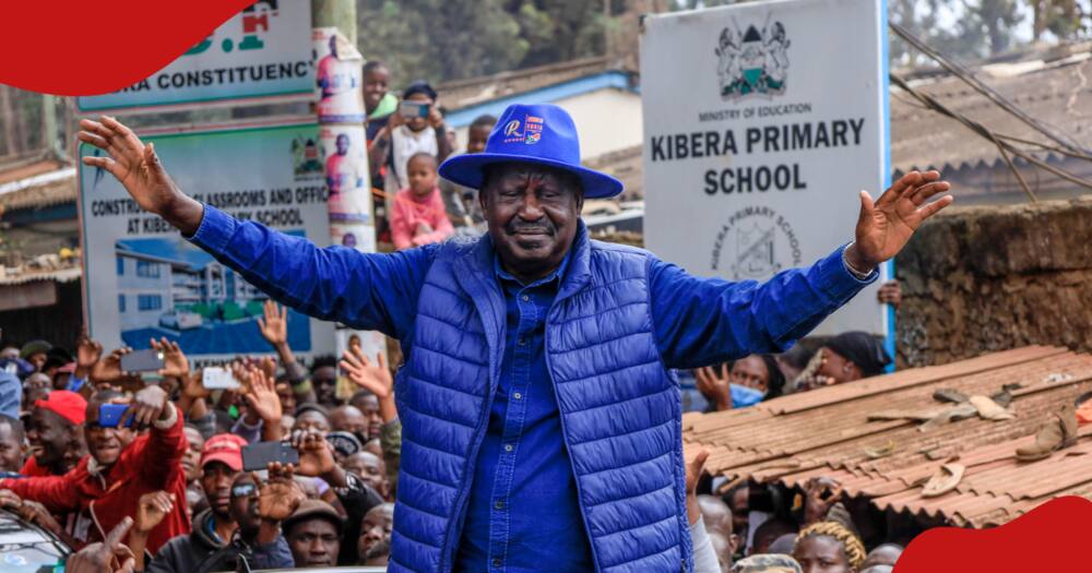 Raila Odinga greeting supporters in Kibera constituency on election day.