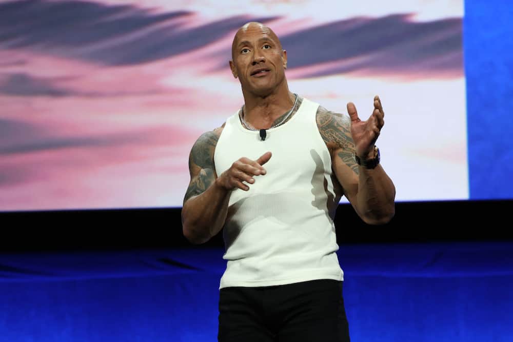 Dwayne "The Rock" Johnson speaking at an event